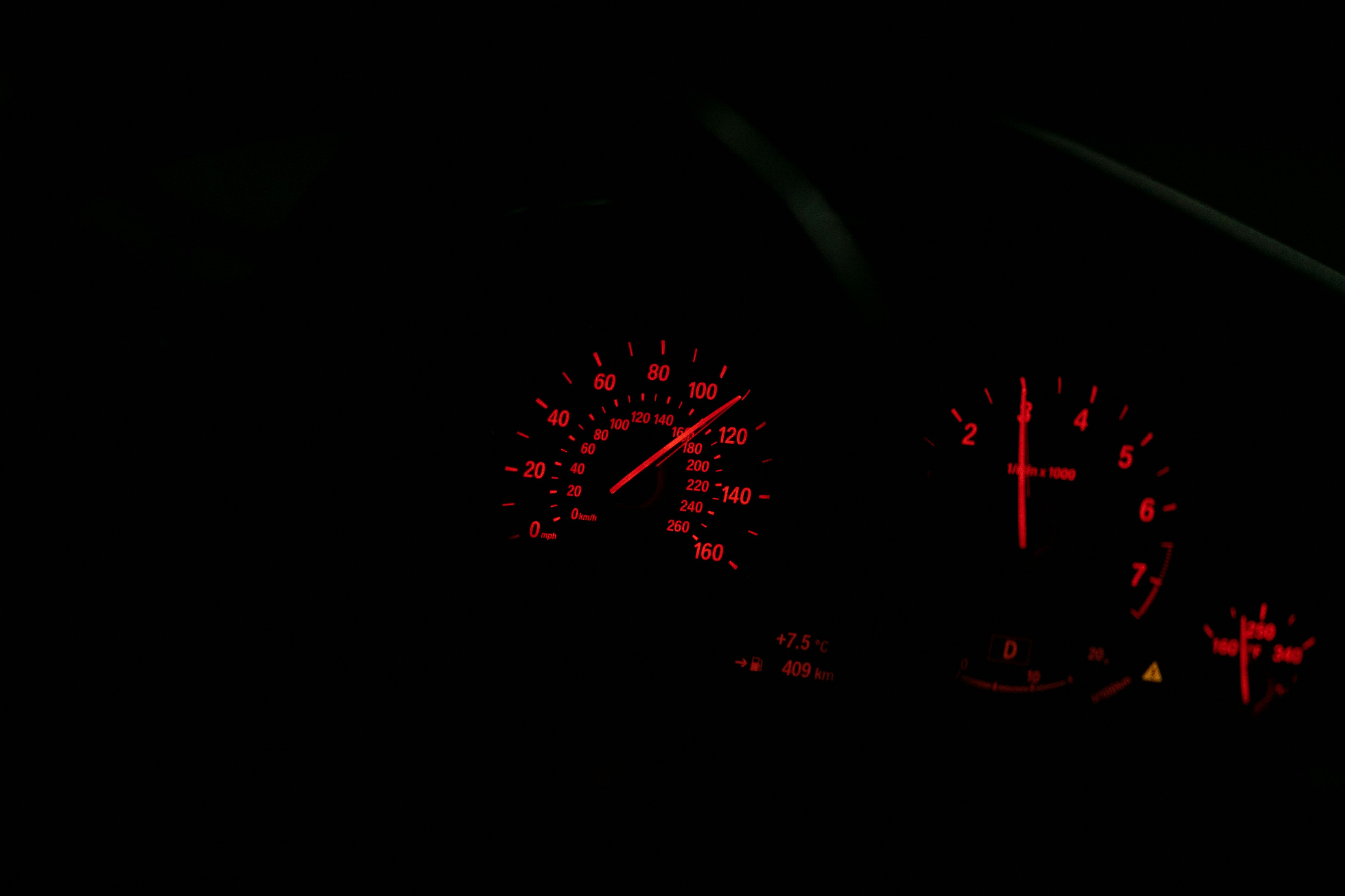 black and red digital speedometer